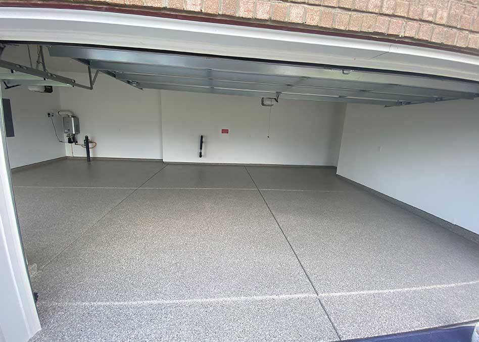 a garage with concrete coated floor